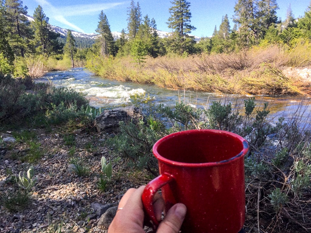 drinking by river in campground