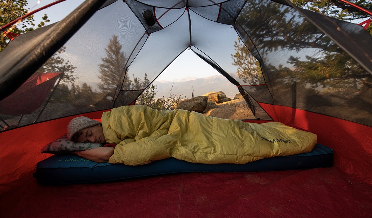 sleeping with camping quilt