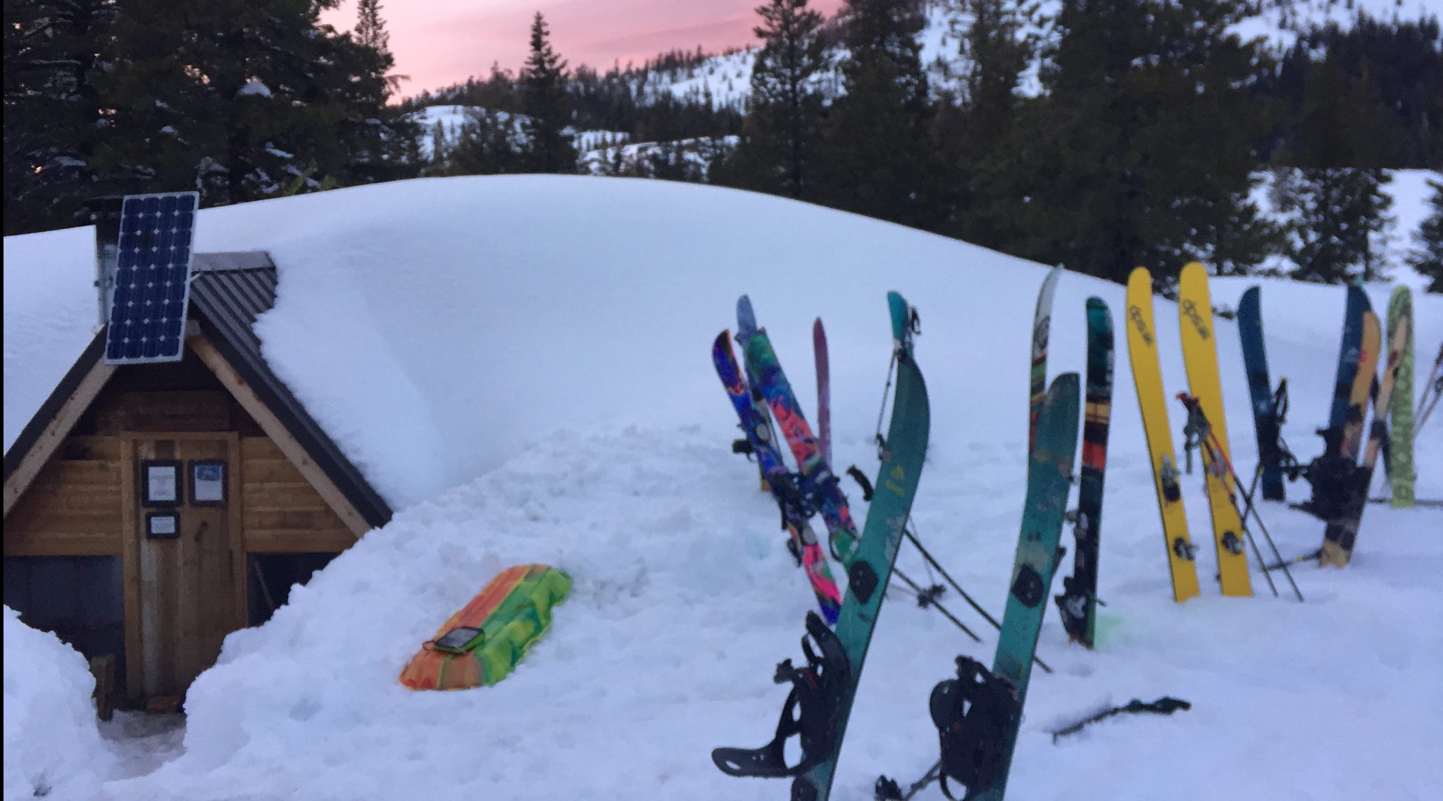 setting up skis at winter basecamp