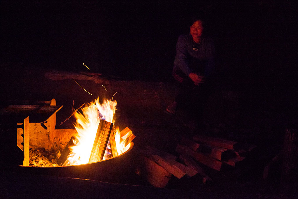 sitting at campfire