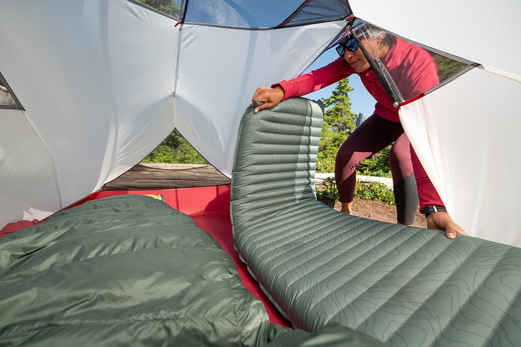 putting sleeping pads in tent