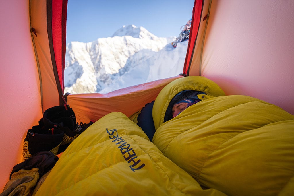 sleeping in tent in the snowy mountains