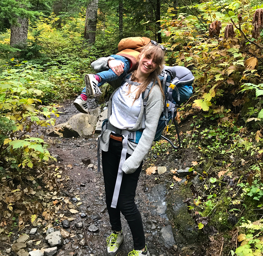 Katie Nash backpacking with child