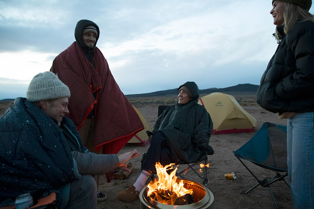 friends around campfire