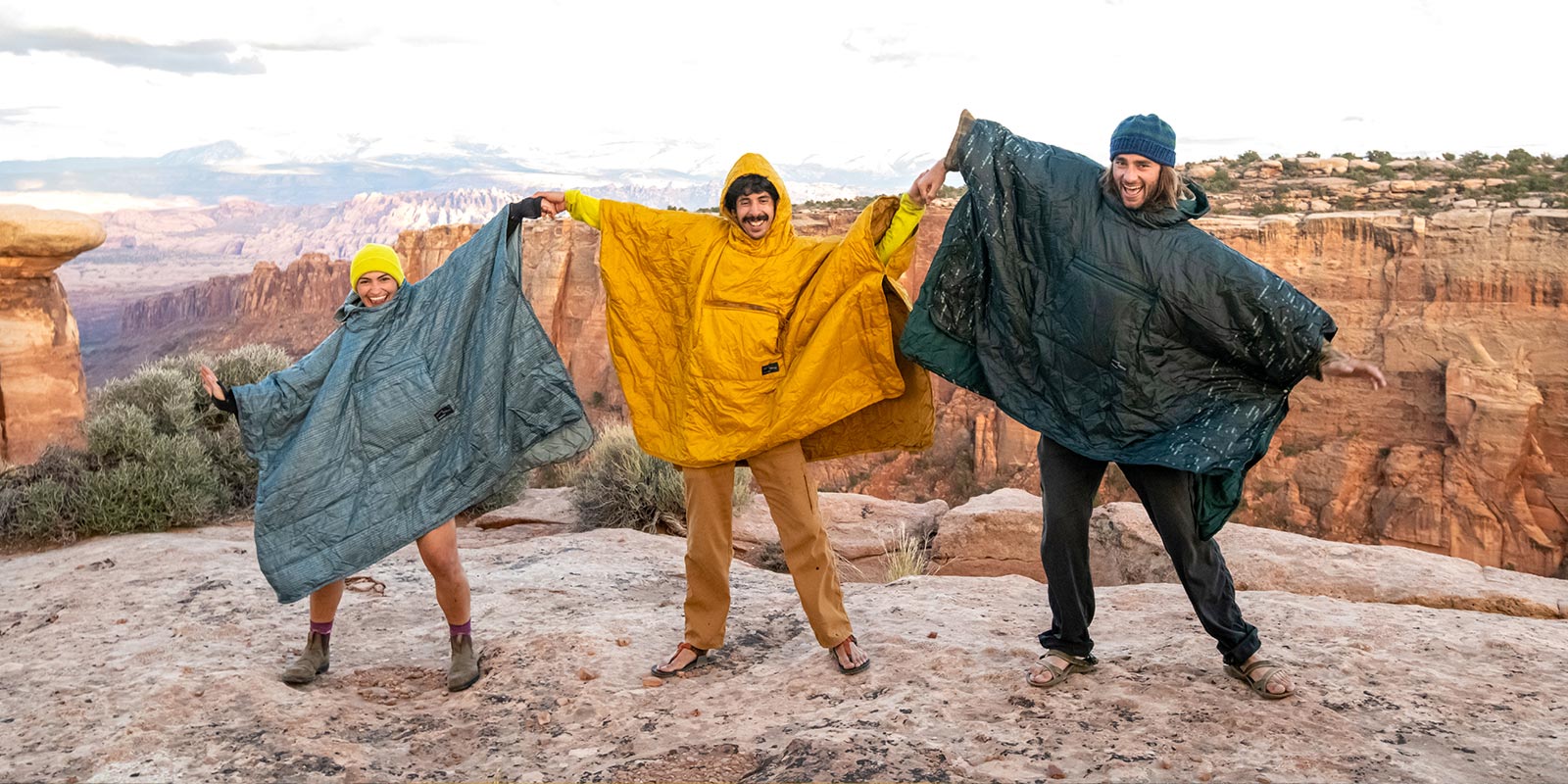 Three people in Therm-A-Rest Honcho Ponchos